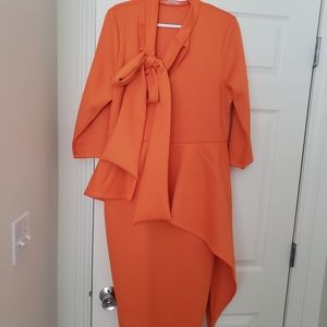 Beautiful orange peplum dress